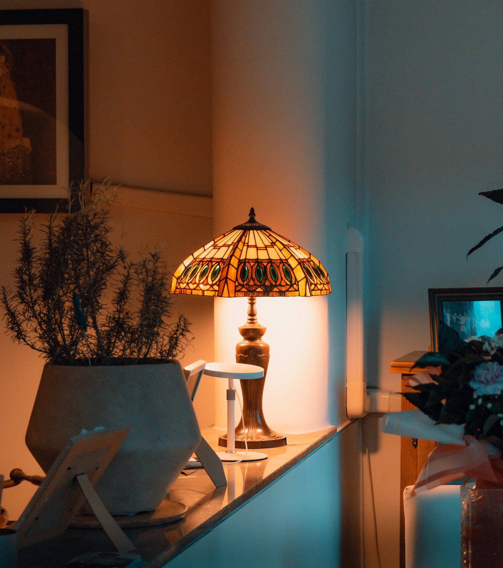 Modern living room decor with organized furniture and warm lighting